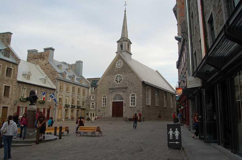 Canada East Tour 2006109.JPG - Bishop Laval's chapel was rededicated in 1690 as �glise Notre-Dame-des-Victoires when 34 British ships withdrew after a five-day siege of the city. "Victory" singular became "victories" plural in 1711 after a British naval attack was disrupted by a violent storm. When the British came a third time, in 1759, they stayed, and the church was almost completely destroyed by their bombardment.
